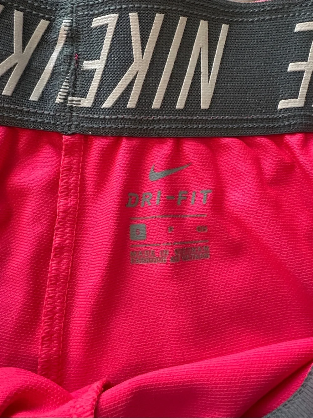 Nike Women's Neon Pink Athletic Shorts with Swoosh